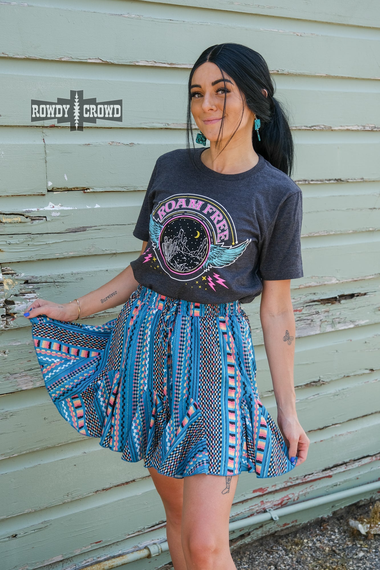 western apparel, western graphic tee, graphic western tees, wholesale clothing, western wholesale, women's western graphic tees, wholesale clothing and jewelry, western boutique clothing, western women's graphic tee, band style graphic tee, desert scene graphic tee, cactus, desert scene, bright graphic tee, colorful graphic tee, neon graphic tee, colorful western graphic tee, western desert scene graphic tee, roam free, band tee inspired