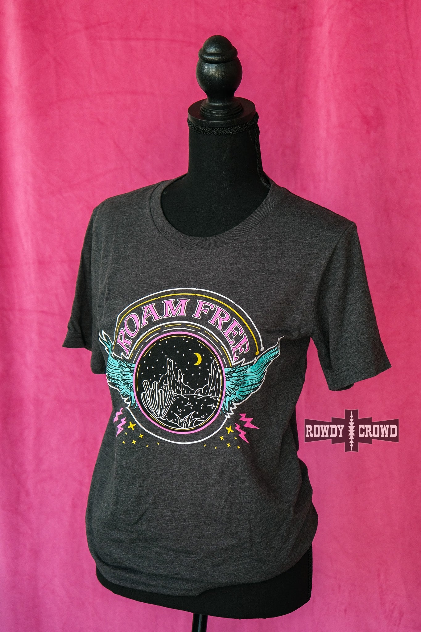 western apparel, western graphic tee, graphic western tees, wholesale clothing, western wholesale, women's western graphic tees, wholesale clothing and jewelry, western boutique clothing, western women's graphic tee, band style graphic tee, desert scene graphic tee, cactus, desert scene, bright graphic tee, colorful graphic tee, neon graphic tee, colorful western graphic tee, western desert scene graphic tee, roam free, band tee inspired